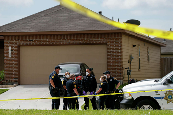 House with Yellow Police Tape