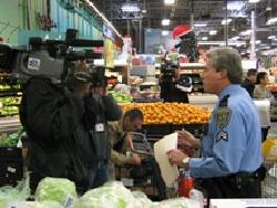 Officers distributing crime prevention flyers