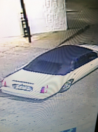 Surveillance photos of one wanted vehicle